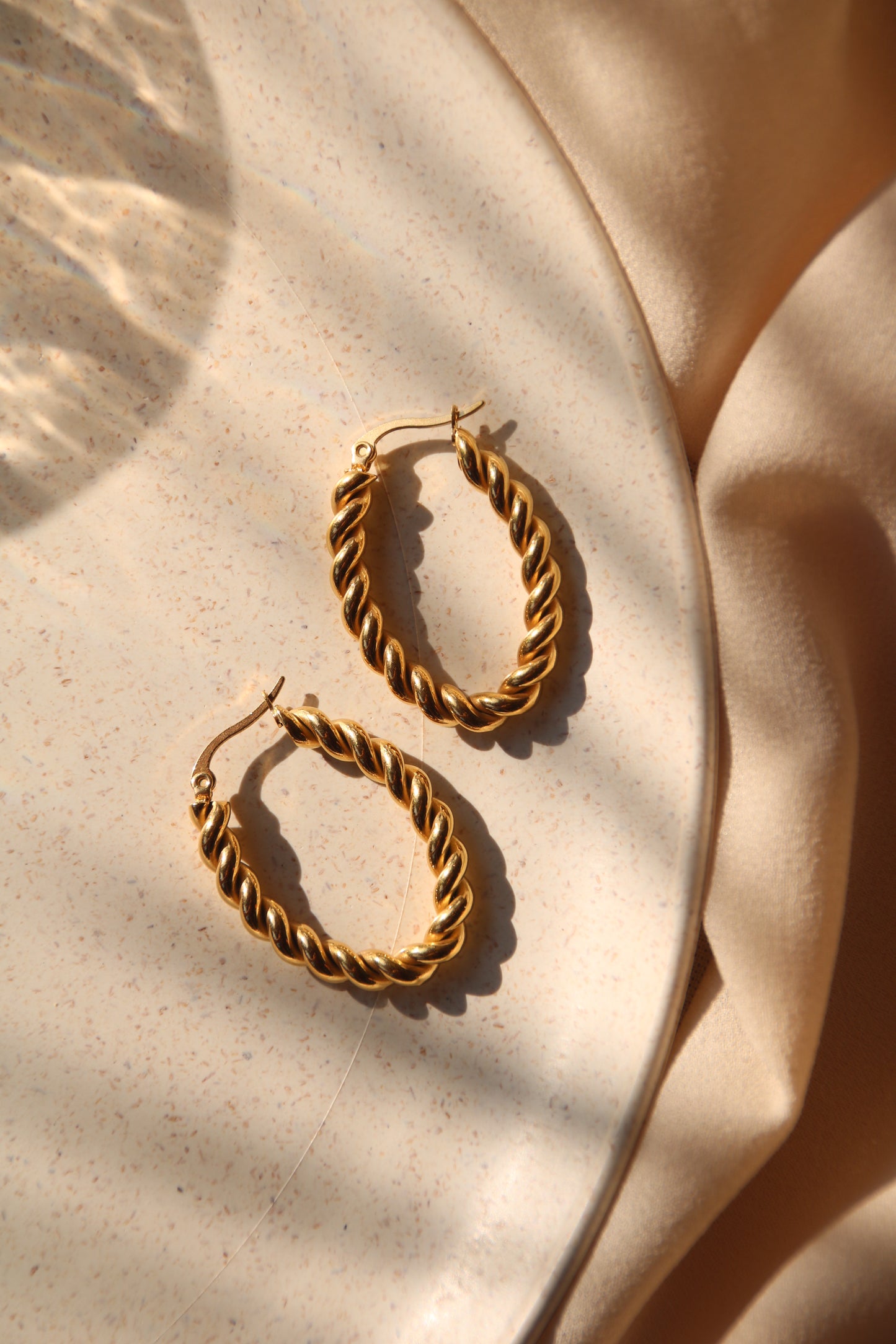 Boucles d'oreilles créoles ovales tressées en acier inoxydable 18 carats